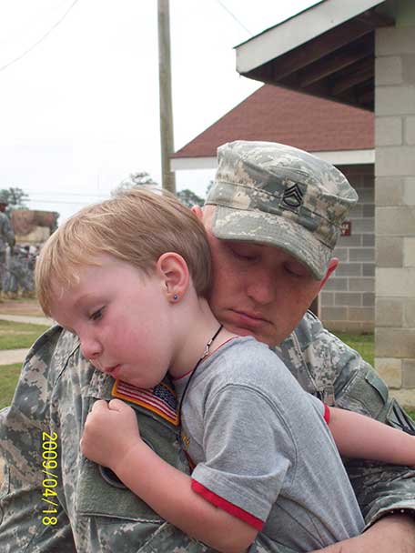 United States Army Staff Sergeant W. Byrd and his son Brandon on the day he shipped out to Afghanistan