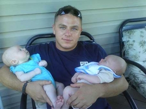 My Brother USMC Sgt. John Fritchman Jr. Just Came Home From Bahrain To Meet His New Niece And Nephew. Our Family's Biggest Hero!