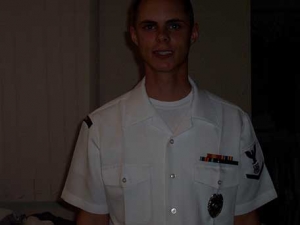 Petty Officer Third Class Jonathan L. Holcomb of the United States Navy