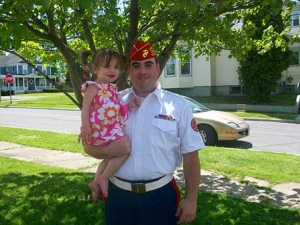 Former United States Marine and current United States Army enlistee Jordan Cecot with his daughter Aubrianna