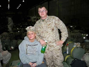 Josh Olson of the United States Marines currently serving in Iraq. You're the best big brother ever, i love n miss you!