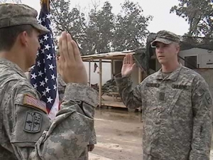 Army Staff Sergeant Nicholas Fontaine re-enlisting while serving in Iraq Hometown: Barton, VT